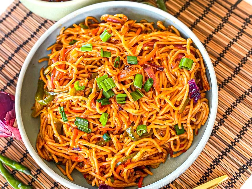 Wok-tossed Hakka noodles with vegetables and spring onion — Indo-Chinese in Cairns