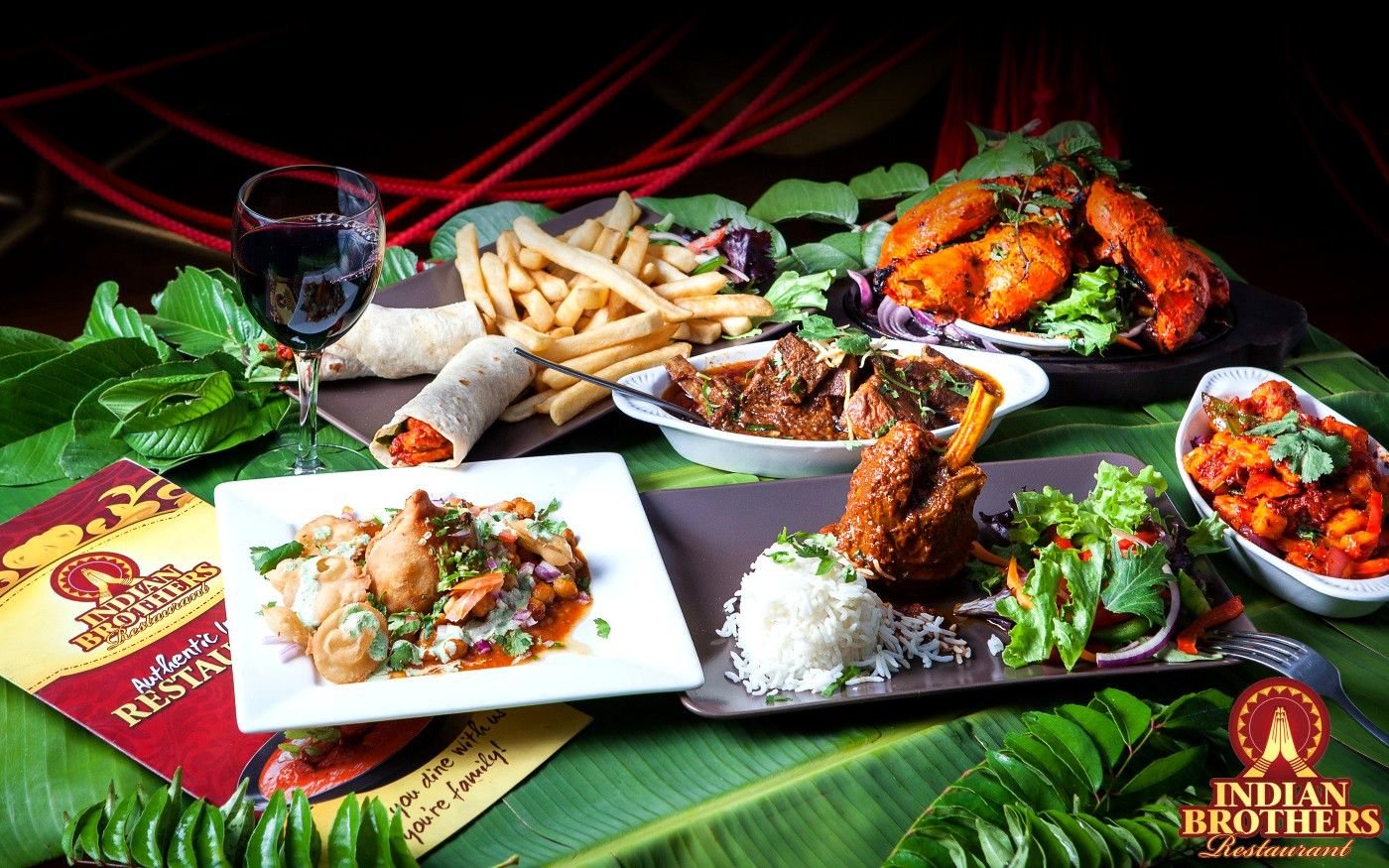 A shared Indian feast at Indian Brothers, an authentic Indian restaurant in Cairns — tandoori, curries, lamb shank, rice and naan